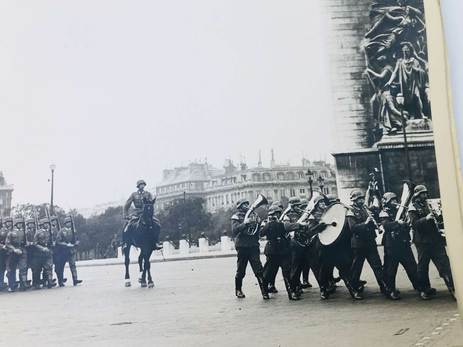 Professionally mounted photograph of German parade in Paris