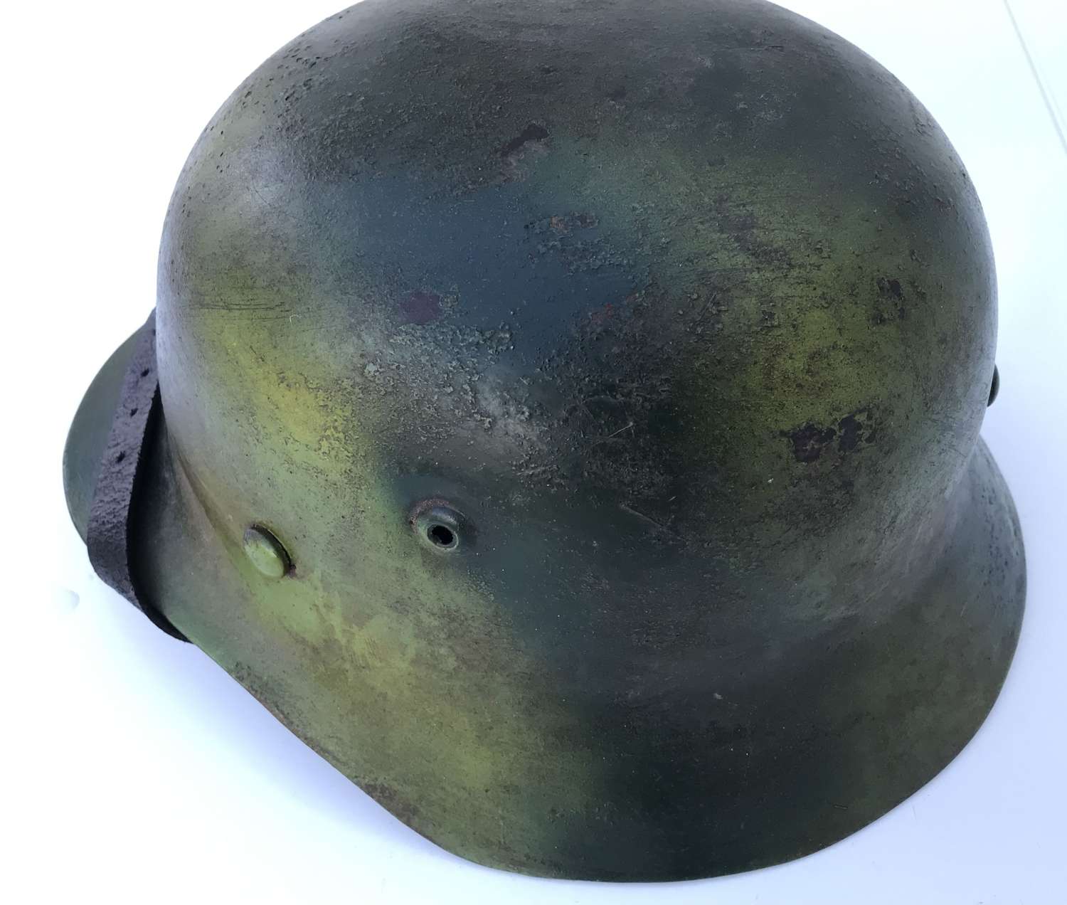 Reproduction camouflaged German helmet