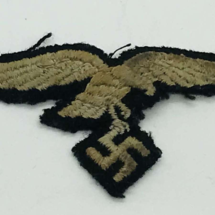 Luftwaffe cap eagle on black background (Herman Goering)