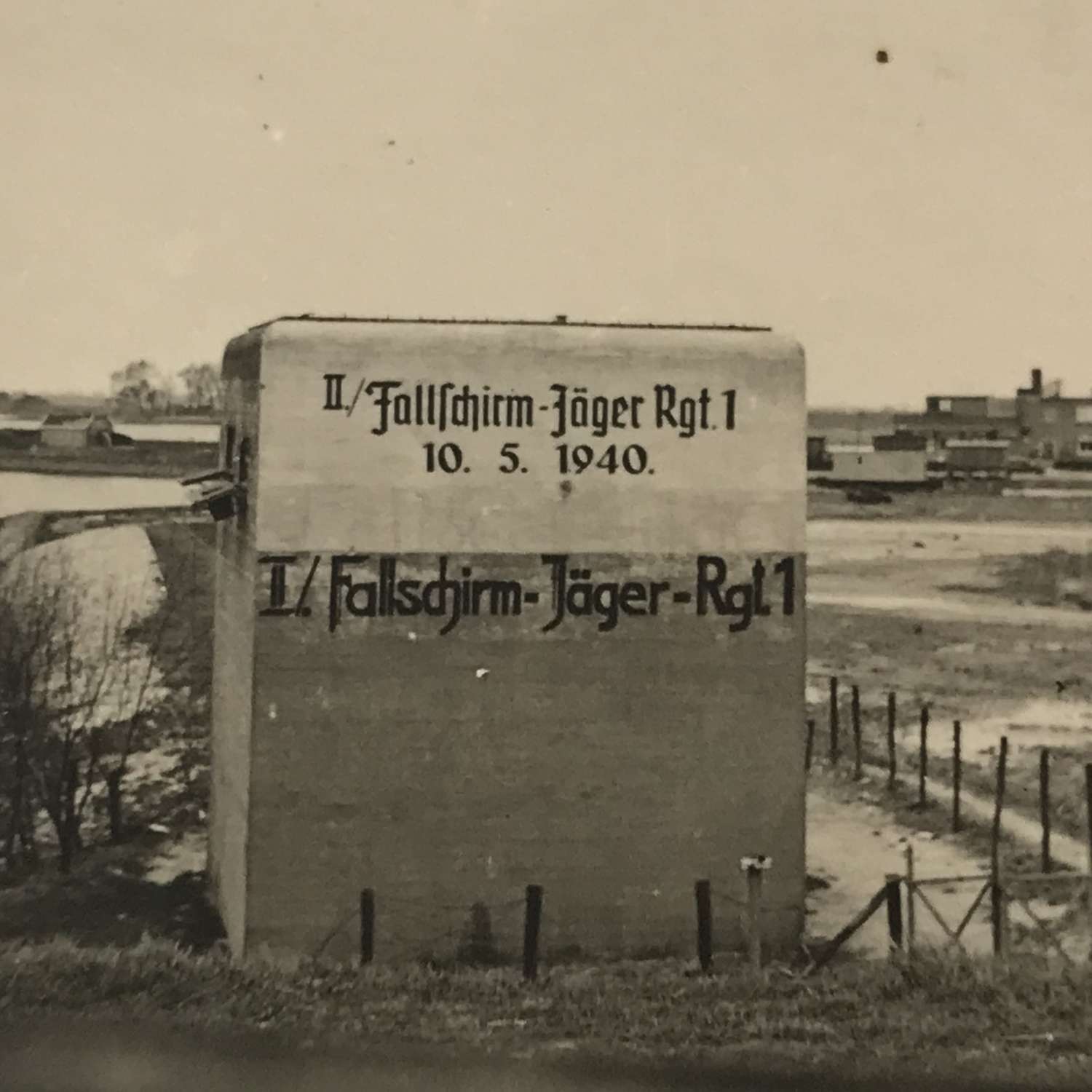 Photo of pillbox captured and graffitied by Fallschirmjager Regt 1