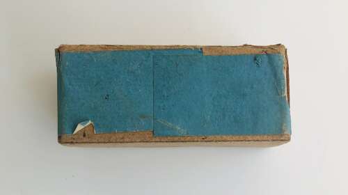 An empty Mauser p08 9mm ammo box
