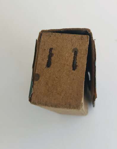 An empty Mauser p08 9mm ammo box