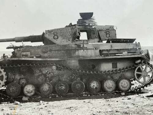 An official photograph of a destroyed Mark IV 75 mm panzer