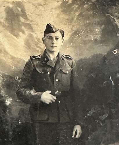 A postcard image of young Waffen  SS man dated 1944