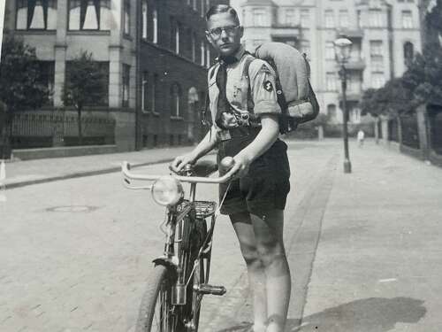 Large image of a member of the HJ with bicycle