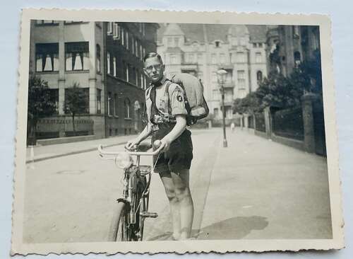 Large image of a member of the HJ with bicycle