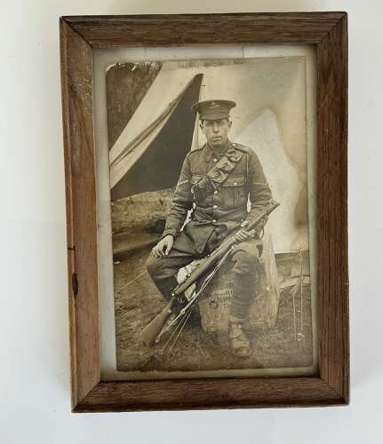 A framed image of WW1 young British Tommie (Royal artillery)