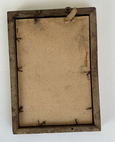 A framed image of WW1 young British Tommie (Royal artillery)