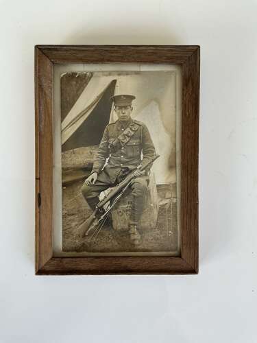 A framed image of WW1 young British Tommie (Royal artillery)