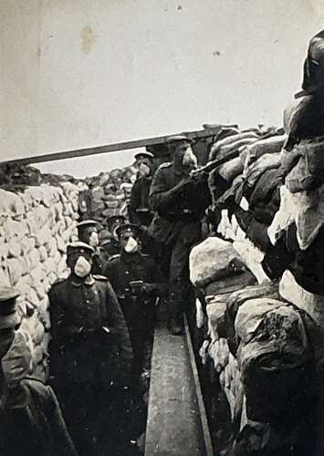 Image of a frontline German  troops wearing early gas masks  1915?