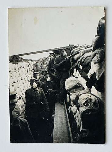 Image of a frontline German  troops wearing early gas masks  1915?