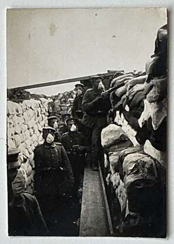 Image of a frontline German  troops wearing early gas masks  1915?